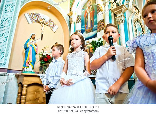 Mukyluntsi , Ukraine - 26 june, 2016: First holy communion