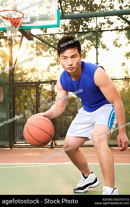 Street basketball player on the court, portrait