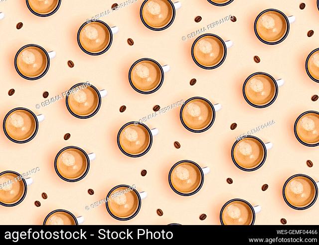 Pattern of coffee beans and mugs of coffee