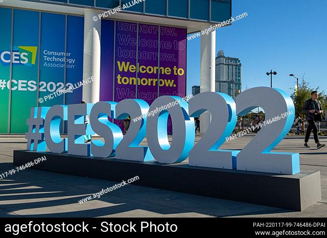 06 January 2022, US, Las Vegas: A large hashtag ""#CES2022"" stands in front of the grounds of the CES tech show in Las Vegas