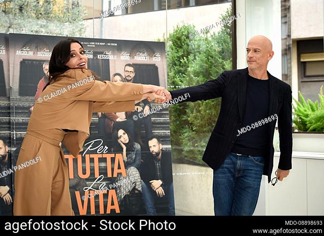 Italian actress Claudia Pandolfi, in Federica Tosi dresses, and the italian actor Filippo Nigro attends the photocall for the presentation of the film Per Tutta...