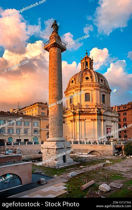 ROME, ITALY - 1 NOVEMBER 2013: Trajan's Column and Santa Maria di Loreto Church in Rome. The structure is about 30 metres in height and 35 metres including its...