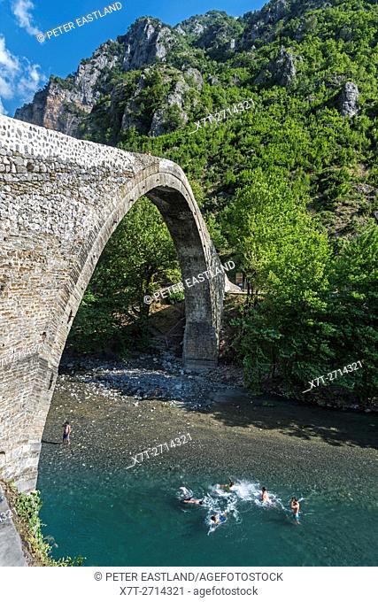 The old stone bridge across the Aoos river at Konitsa, Epirus, Northern Greece