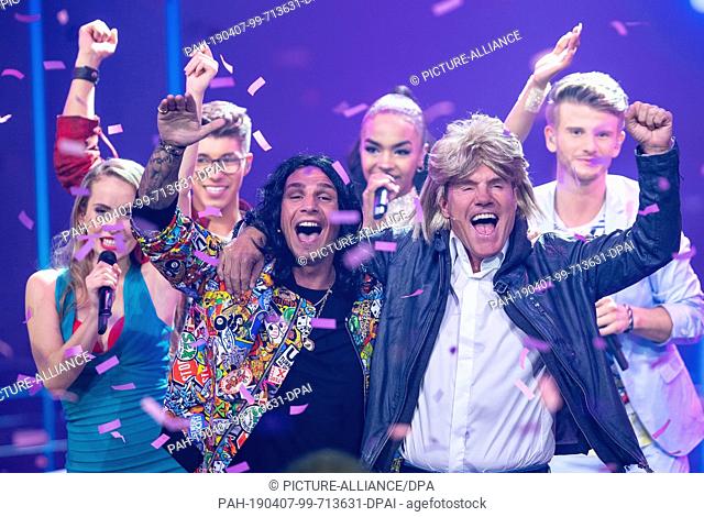 06 April 2019, North Rhine-Westphalia, Köln: Dieter Bohlen (r) and Pietro Lombardi, as Thomas Anders, perform the song ""Cheri Cheri Lady"" with wigs and the...