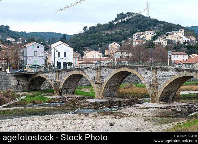 Ales, Occitanie, France, 12 30 2022 - The Rochebelle roman bridge and the river Gardon