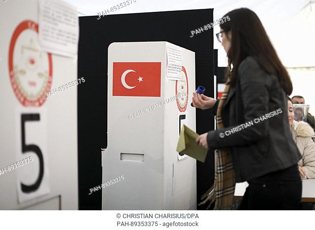 A woman casts her vote in Hamburg, Germany, 27 March 2017. Some 32, 000 Turkish citizens in Hamburg and Schleswig-Holstein are entitled to vote in the...
