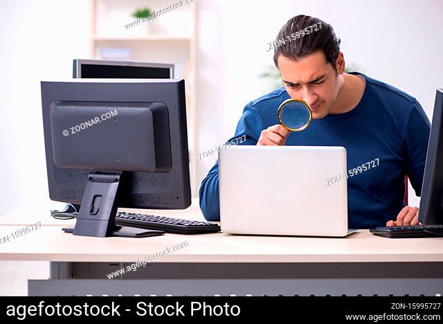 Young it specialist working in the office
