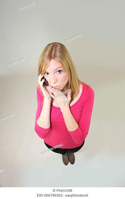Surprised woman on a cellphone