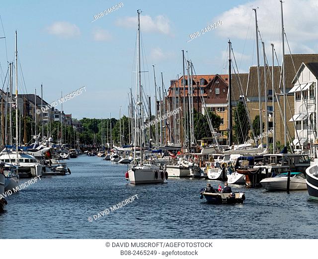 Modern apartments and boats at Christianshavn harbour area, Copenhagen, Denmark