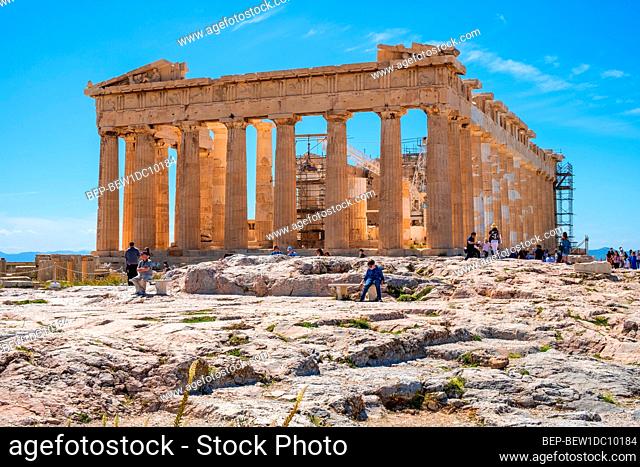 Athens, Attica / Greece - 2018/04/02: Panoramic view of Parthenon - temple of goddess Athena - within ancient Athenian Acropolis complex atop Acropolis hill