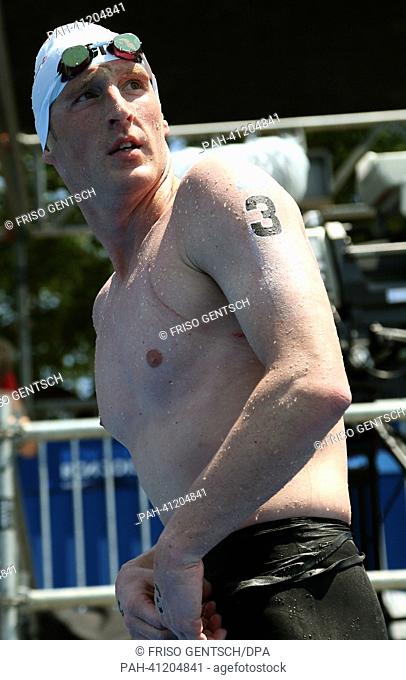Thomas Lurz of Germany reacts after the men's 10 km Marathon Open Water event of the 15th FINA Swimming World Championships at Moll de la Fusta on the coast of...