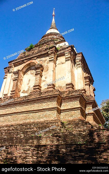 Vertical photo of a chedi in Wat Ched Yot temple in Chiang Mai, Thailand