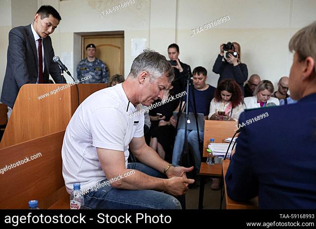 RUSSIA, YEKATERINBURG - MAY 18, 2023: Former mayor Yevgeny Roizman (declared a foreign agent in Russia), centre, and his lawyer Vladislav Idamzhapov (L front)...