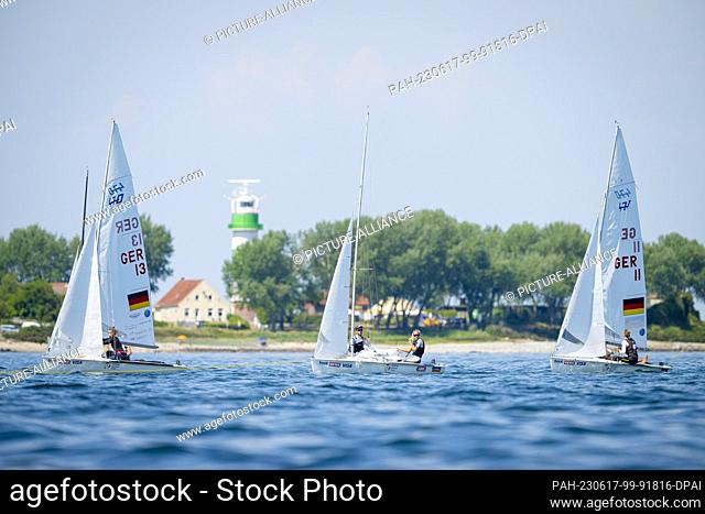 17 June 2023, Schleswig-Holstein, Kiel: Sailing: Kiel Week - Olympic classes. On the first day of competition there is calm on the Kiel Fjord