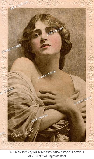 English actress of stage and screen, Gladys Cooper (1888-1971), with her hands clasped across her chest