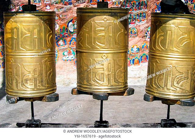 Prayer wheels at 1000 Buddhas shrine on the Lingkor pilgrim way Lhasa Tibet