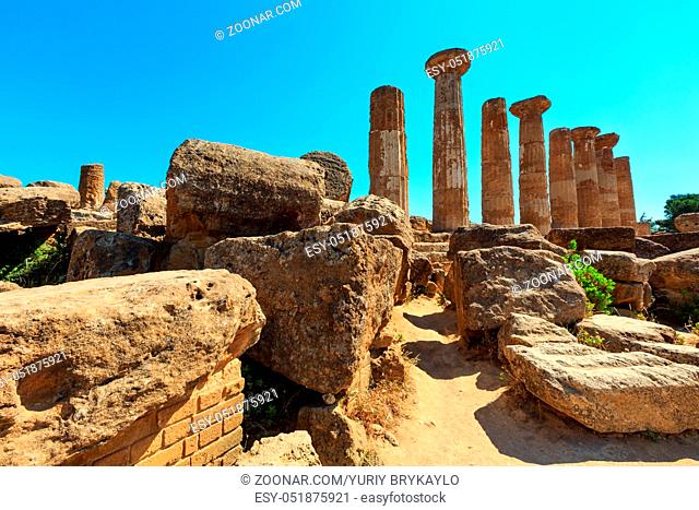 Ruined Temple of Heracles columns in famous ancient Valley of Temples, Agrigento, Sicily, Italy. UNESCO World Heritage Site