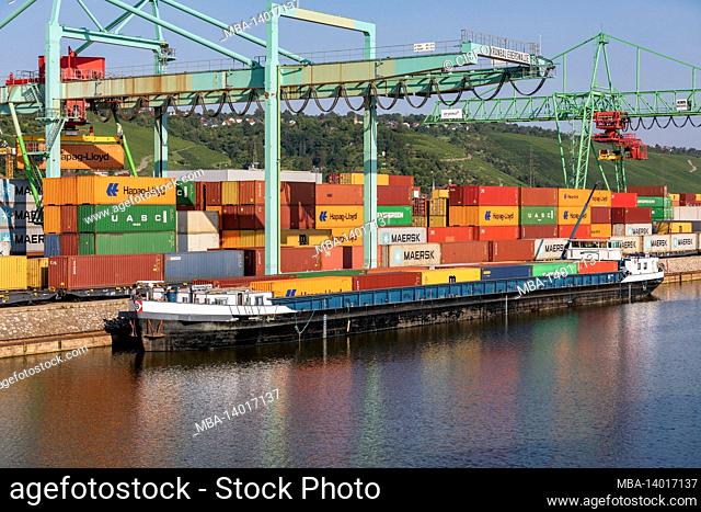 germany, baden-wuerttemberg, stuttgart, cargo loading, cranes, bridges and containers in the stuttgart port