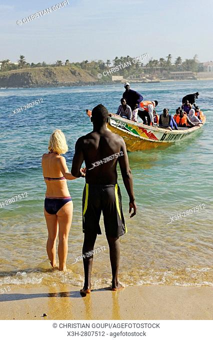 interracial couple on a beach of Ngor island, Dakar, Senegal, West Africa