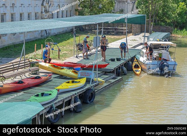 VYLKOVE, ODESSA OBLAST, UKRAINE - JULY 11-15, 2020: Vilkovo city - Ukrainian Venice, lifestyle in an old town standing on water