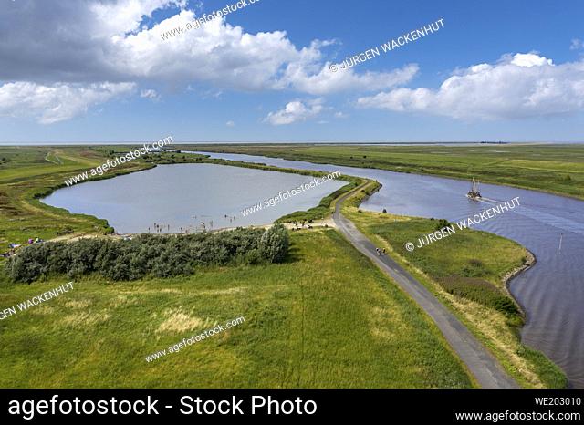Drone view with bathing lake Greetsiel and the landscape at the Leyhoerner-Sieltief, Greetsiel, Lower Saxony, Germany, Europe