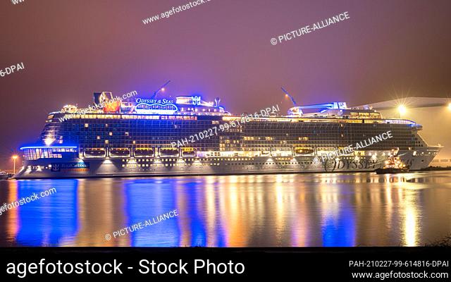 27 February 2021, Lower Saxony, Papenburg: The cruise ship ""Odyssey of the Seas"" lies in the shipyard basin shortly before being transferred from the Meyer...