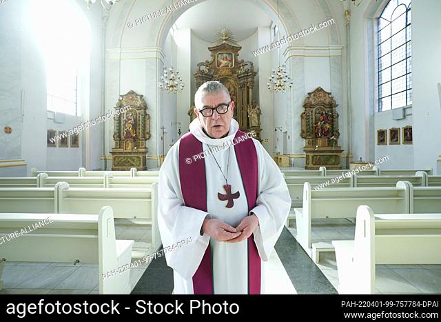 22 March 2022, Hamburg: Father Karl Schultz stands in the St. Joseph Catholic Church on the Große Freiheit in the St. Pauli district