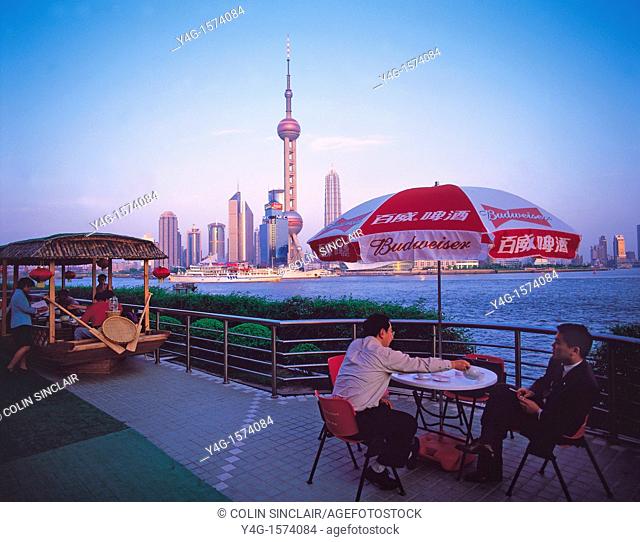 Shanghai, China, Riverside cafe Huangpu River, Pudong background