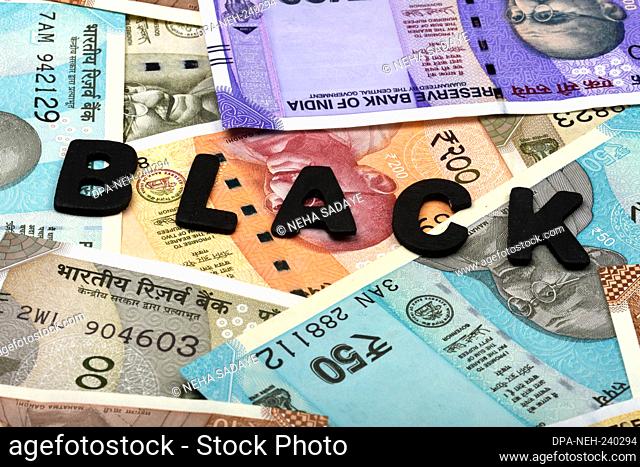 Black money concept, black alphabet on money background, Indian Currency, Rupee, Indian Rupee, Indian Money, Business, finance, investment