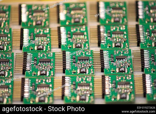 A stack of microchips lying on a table