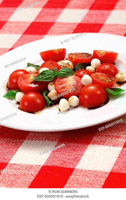Caprese salad on table cloth