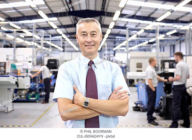 Portrait of manager in engineering factory
