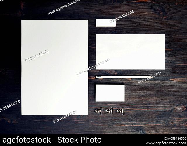 Blank corporate stationery set on wooden background. Template for branding design. Branding mock up. Flat lay