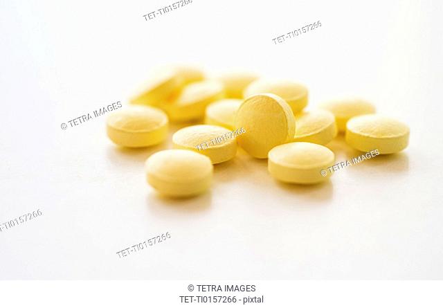 Yellow pills, studio shot