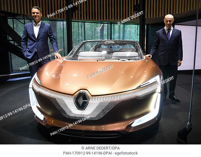 Thierry Bolloré (R), Vice-president of Renault and chief designer Laurens van den Acker present the study Renault Symbioz at the Renault stand of the...