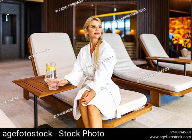 Beautiful woman relaxing in a beauty spa hotel - Client having a beauty treatment in a beauty spa salon