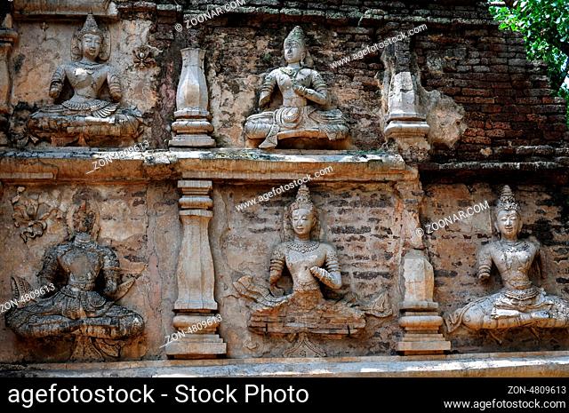Ancient wat ruins of Buddha sculptures in Chiang Mai, Thailand