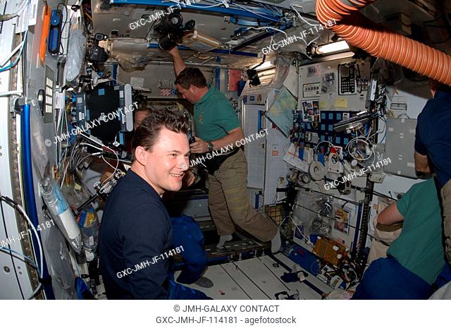 Russian cosmonaut Roman Romanenko, Expedition 21 flight engineer, is pictured in the Harmony node shortly after Space Shuttle Atlantis and the International...