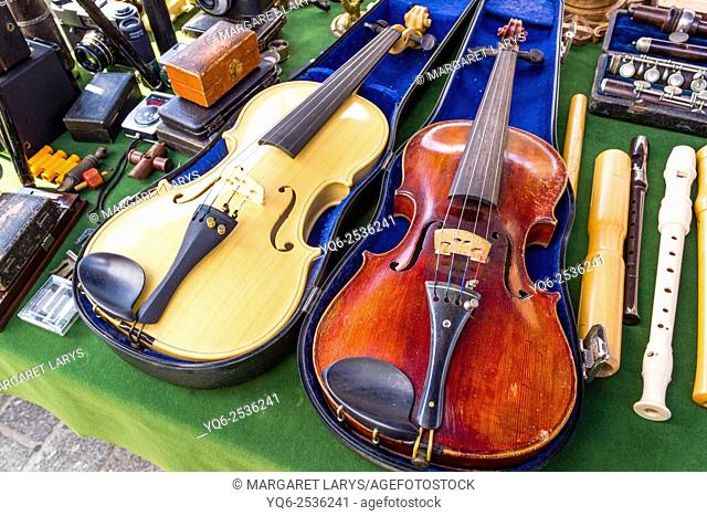 Vintage violins in the antiques fair in Krakow