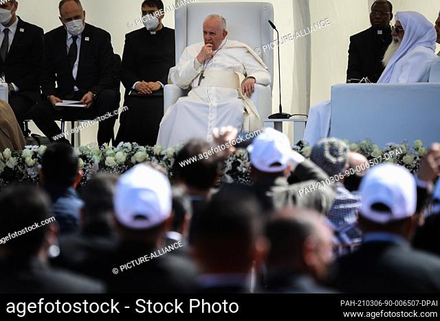 06 March 2021, Iraq, Nasiriyah: Pope Francis (C) attends an interreligious meeting in the Sumerian city-state Ur, which is mentioned in the Bible as the home of...
