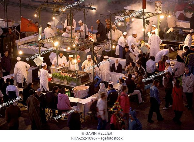Elevated view over Djemaa el-Fna in the evening when the square is filled with food stalls, Marrakech Marrakesh, Morocco, North Africa, Africa