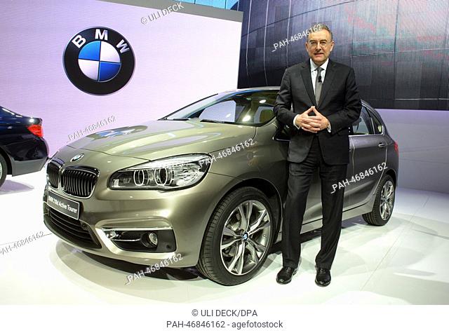 BMW chairman Norbert Reithofer presents the new BMW 2er Active Tourer at the Palexpo exhibition hall during the first press day of the Geneva Motor Show in...