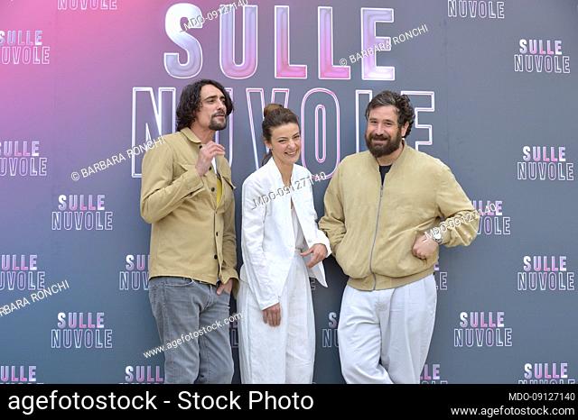 Marco Cocci, Barbara Ronchi and director Tommaso Paradiso attends the photocall of the movie Sulle Nuvole at The Space Cinema Moderno