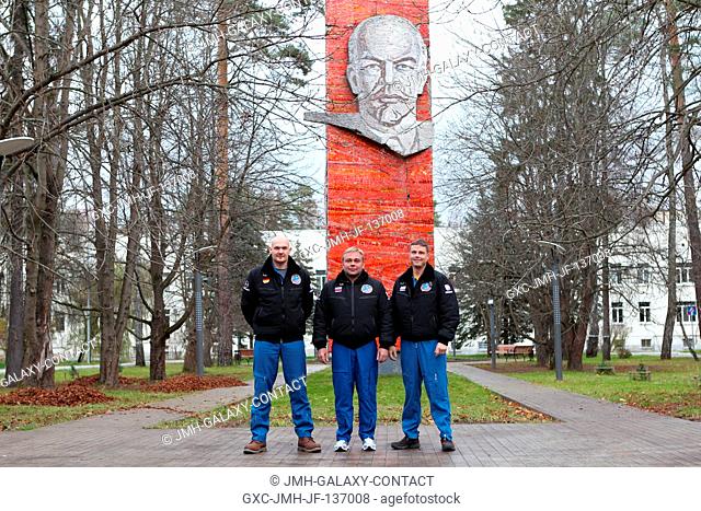 With the statue of Vladimir Lenin serving as a backdrop, the Expedition 38 backup crew members pose for pictures October 26 at the Gagarin Cosmonaut Training...