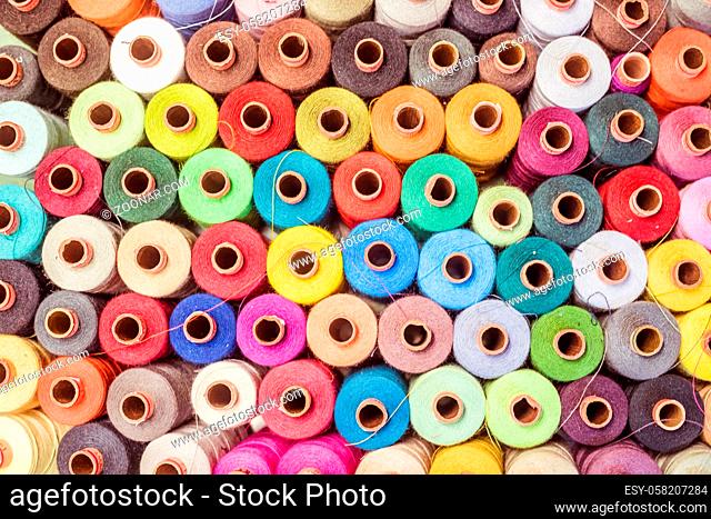 Variety of colorful sewing threads, birds eye