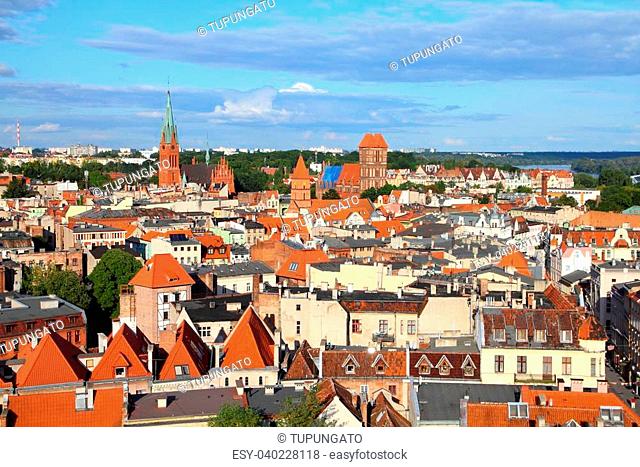 Poland - Torun, city divided by Vistula river between Pomerania and Kuyavia regions. Old town skyline - aerial view from town hall tower