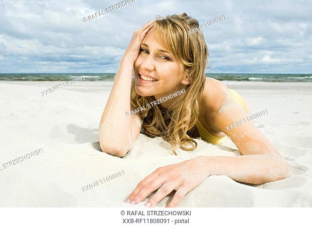 young woman sunbathing