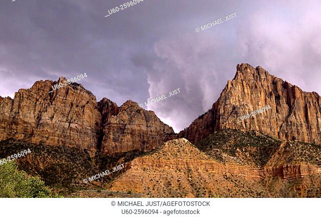 A storm approaches Zion National Park through The Watchman in Southern Utah