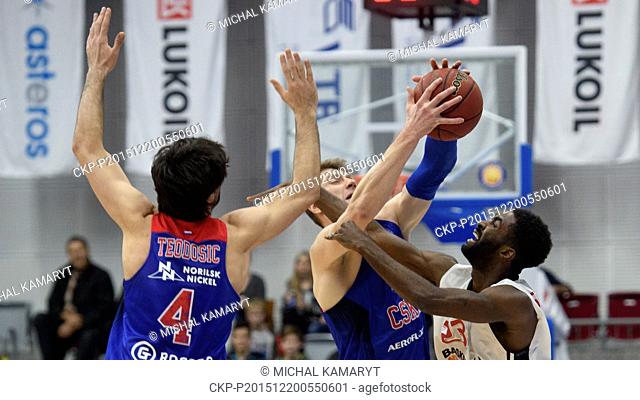 Left to right: Milos Teodosic and Andrej Voroncevic of Moscow and Howard Sant-Roos of Nymburk in action during basketball VTB United League match CEZ Nymburk vs...