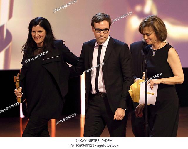 US director Laura Poitras (l-r) and US internet activist Jacob Appelbaum receive the award for 'best documentary' for their film 'Citizenfour'